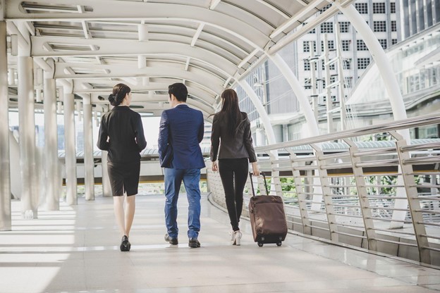 three business professionals on a corporate trip
